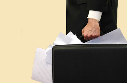 Photo of hand carrying a briefcase