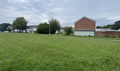 Greenspace with houses in the background
