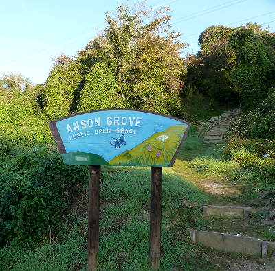 Anson Grove Sign with bushes in the background