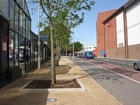 View of Harper Way showing new railings and trees in tree pits on new surfacing