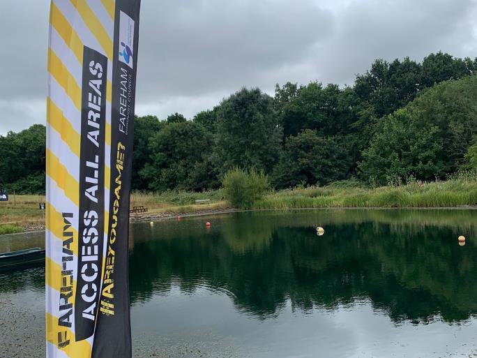 Photo of lake and Access All Areas banner