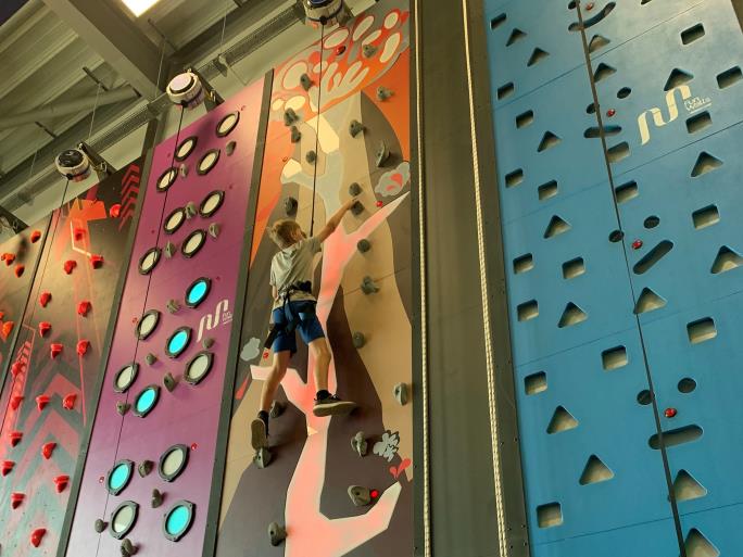 Photo of child on climbing wall