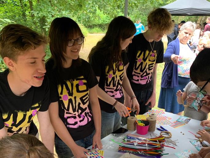 Photo of NCS volunteers at the craft table