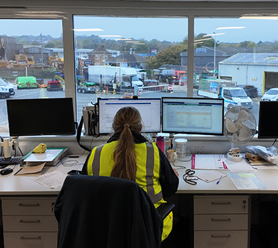 Staff member looking out from Depot