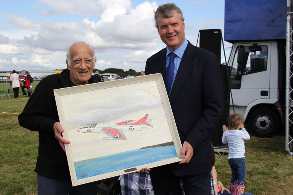 Council Leader being presented with painting