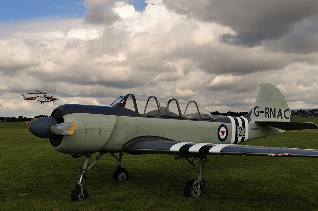 Grey propellor aircraft