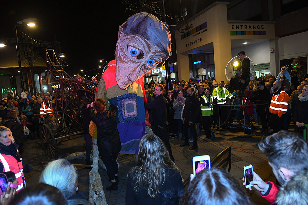 Winter Giant Walking with lantern