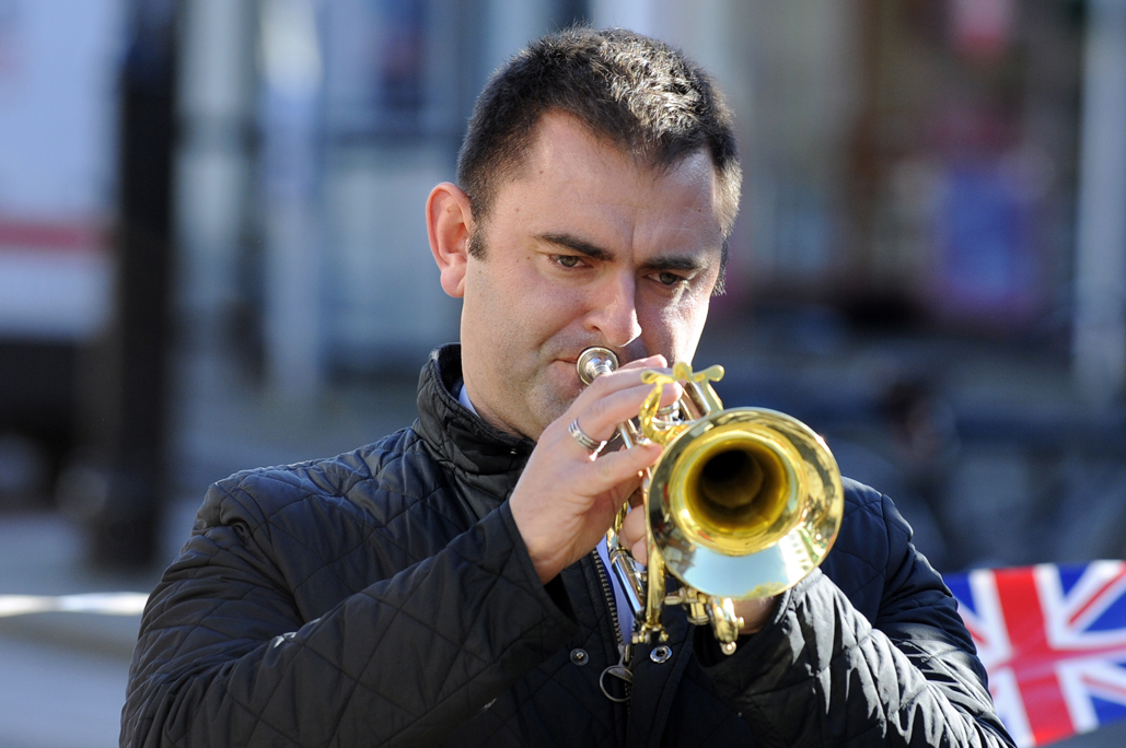 Trumpeter playing last post