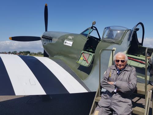 Sqn Ldr, Alan Frost preparing to fly a spitfire